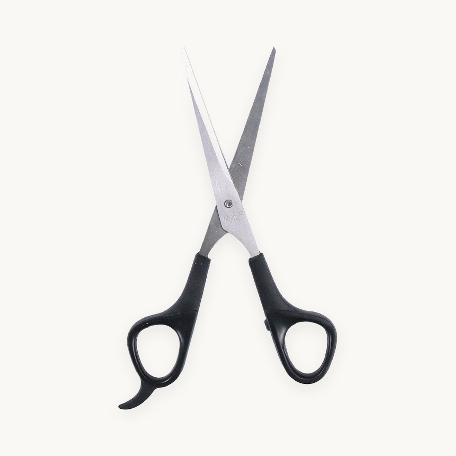Stainless steel grooming scissors with black handles
